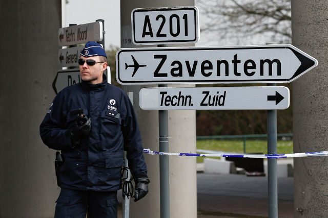 Belgium resumes hunt for airport suspect as criticism mounts