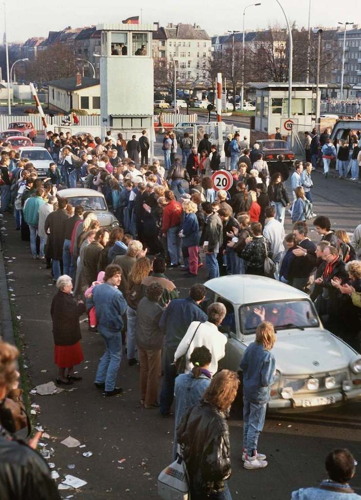 OPEN BORDER. A file picture dated 10 November 1989 shows cheering citizens of Berlin arriving in West Berlin at border crossing Bornholmer Strasse in Berlin. Stringer/File/EPA