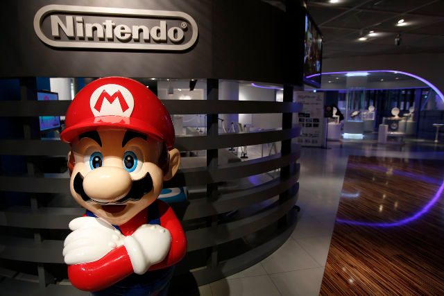Nintendo posts quarterly net loss on Wii U costs