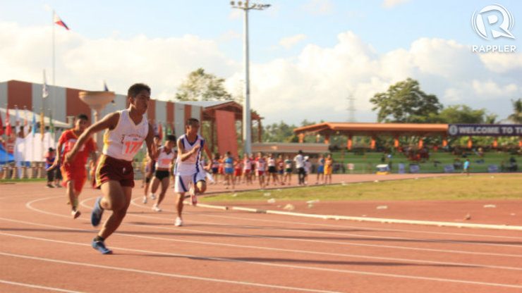A Davao boy rounds the track during the 200 meter track meet. Photo by Maan Tengco/Rappler