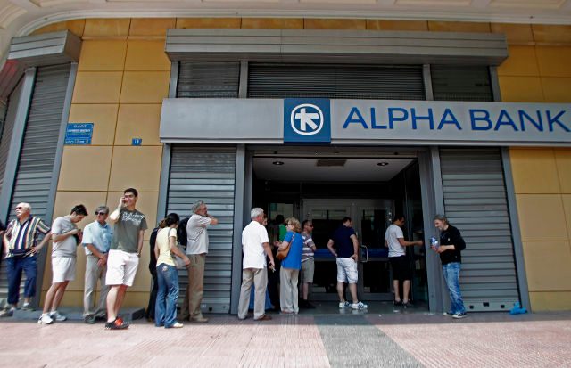 Tourists urged to take cash if visiting stricken Greece