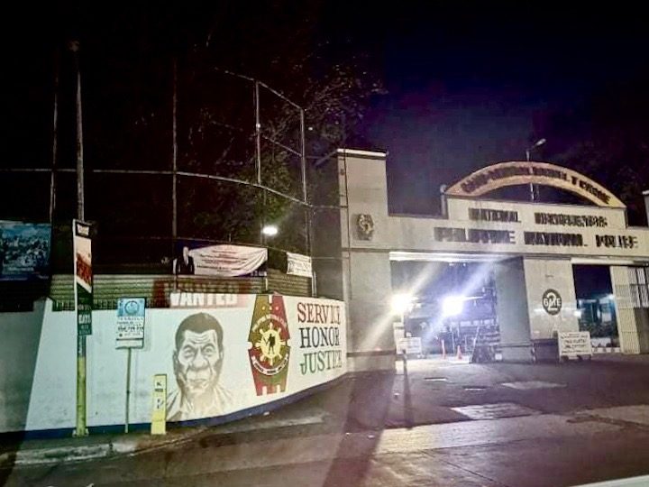 LOOK: Artists flash ‘Duterte wanted’ poster on Camp Crame