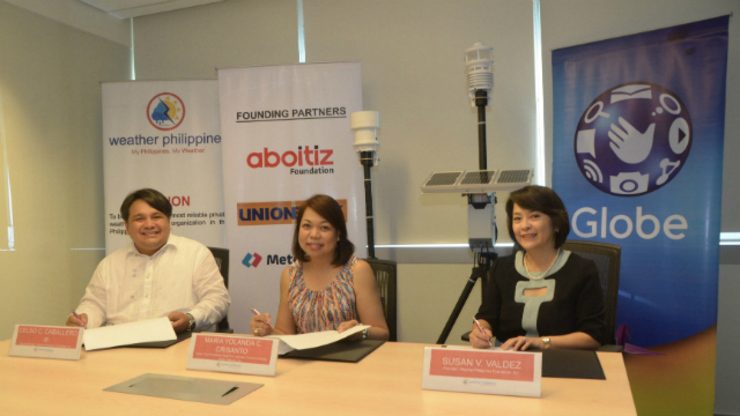 FOR DISASTER RESILIENT COMMUNITIES. Signing the Memorandum of Agreement are (from L-R):  Celso C. Caballero III, General Manager, WeatherPhilippines Foundation;  Yoly Crisanto, Senior Vice President , Corporate Communications, Globe Telecom; and Susan Valdez, President of WeatherPhilippines Foundation and SVP & Chief Reputation and Risk Officer of the Aboitiz Group of Companies. 