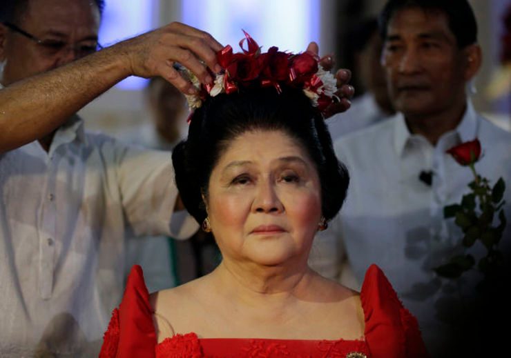 CROWNED. Former Philippine first lady and current Congress Representative Imelda Marcos is crowned with flowers during her 85th birthday celebration in the town of Batac, Ilocos Norte province, northern Philippines, July 2, 2014. File photo by Francis R. Malasig/EPA