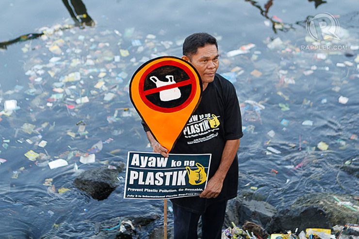 PLASTIC BAN DAY. A volunteer with his call during the clean-up drive and garbage audit.