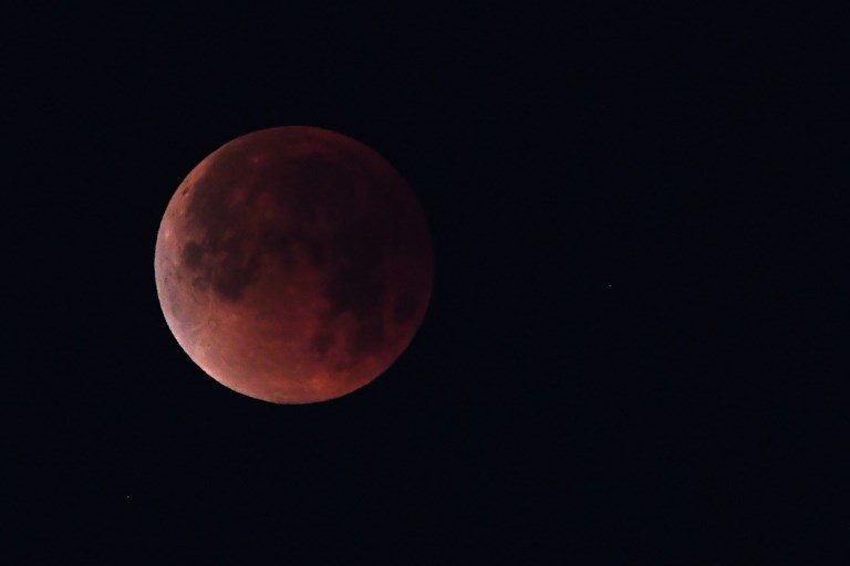 Look up: Red planet and ‘blood moon’ pair up to dazzle night sky