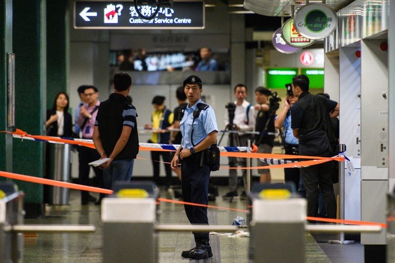 Hong Kong police shoot knifeman in subway station