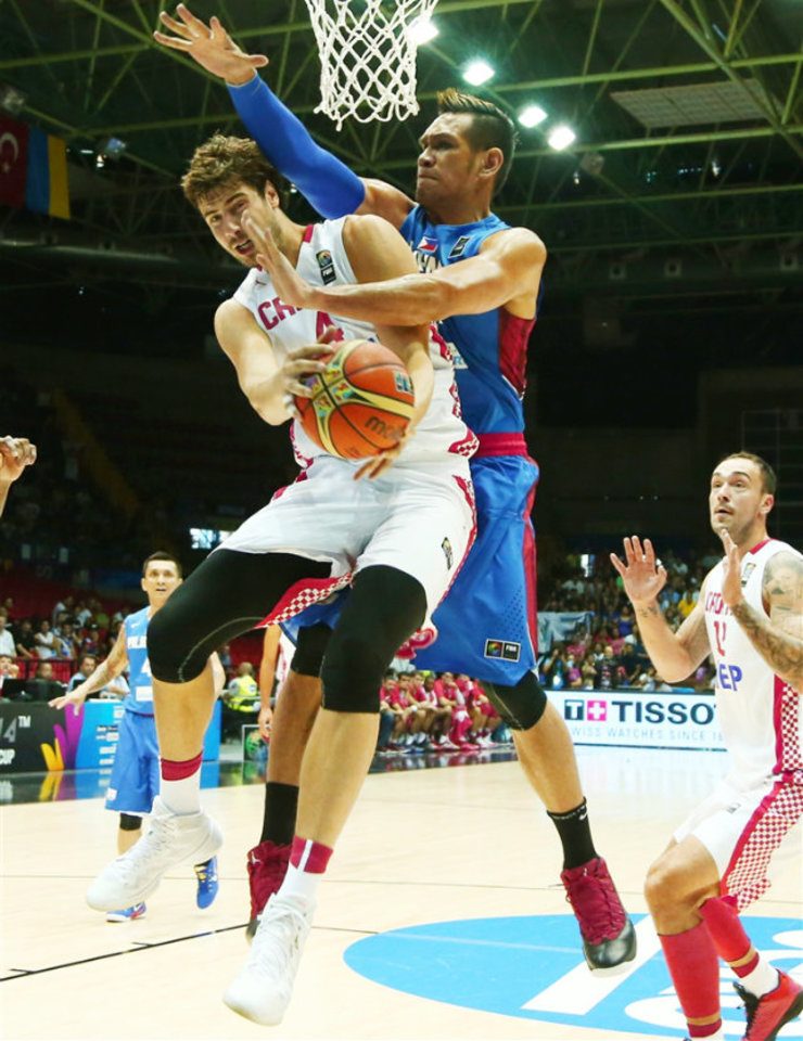 June Mar Fajardo has shown no fear against imposing centers during the FIBA World Cup. Photo from FIBA