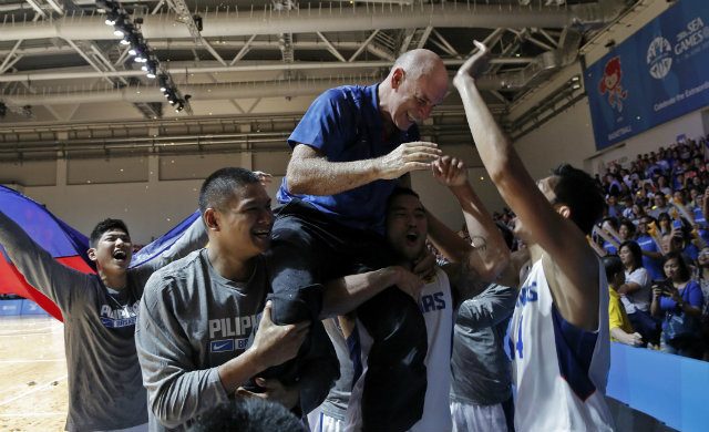 Gilas coach Tab Baldwin gets hoisted up in celebration. Photo by Singapore SEA Games Organising Committee/Action Images via Reuters 