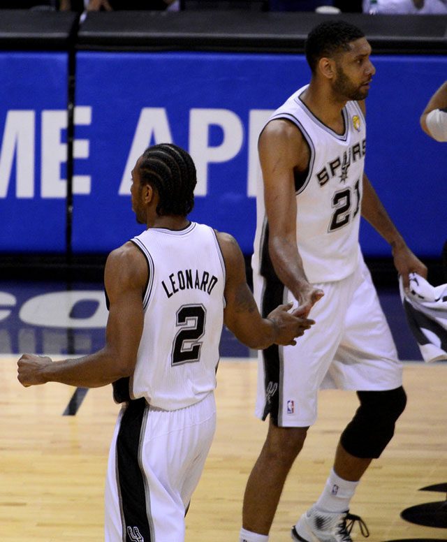 PASSING THE TORCH. From one Finals MVP to another, Tim Duncan acknowledges Kawhi Leonard's fine play. Photo by Ashley Landis/EPA