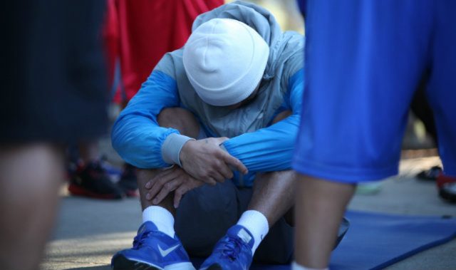 Manny Pacquiao says a silent prayer after his running