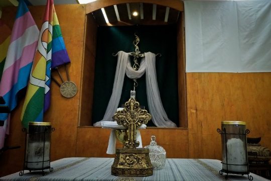 SYMBOLS OF ECUMENISM. Crosses, the sacred flame of love, and the rainbow flags of the LGBT movement are prominently seen inside the chapel of the Metropolitan Community Churches (MCC) in Cubao. 