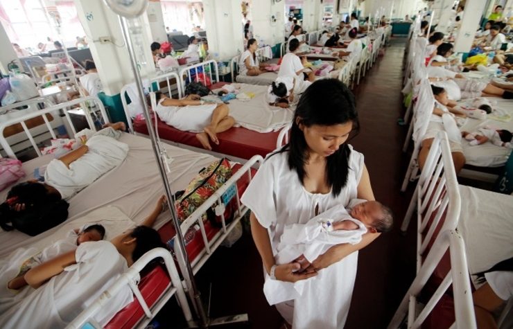 MOTHERS DYING. A report of NEDA and the UN Development Programme says the Philippines is not on track to meet the MDG on reducing maternal mortality. File photo by Ritchie B. Tongco/EPA 