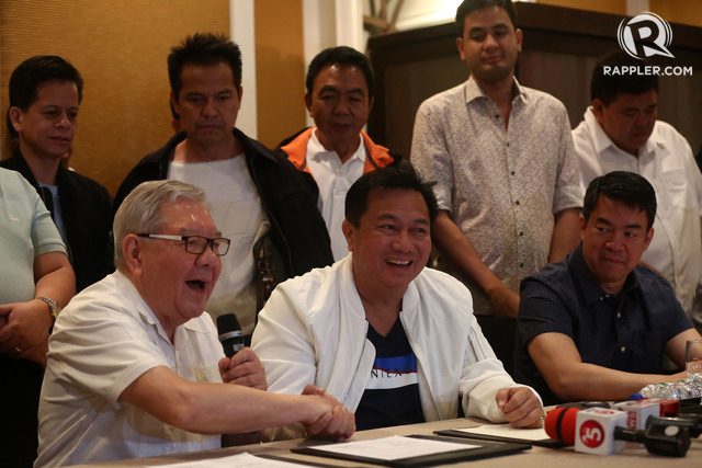 COMPROMISE. Former speaker and Quezon City 4th District Representative Feliciano Belmonte Jr and Speaker Pantaleon Alvarez shake hands after LP signed a coalition agreement with PDP-Laban on July 24, 2016. File photo by Ben Nabong/Rappler  