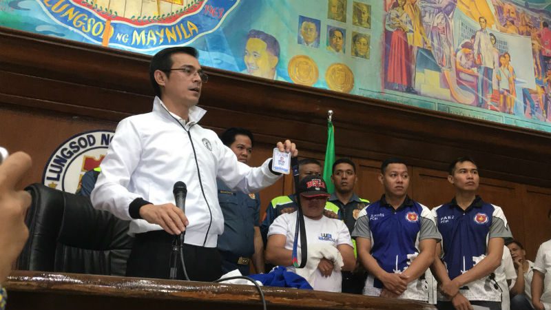 Hours after threats, Isko Moreno presents traffic enforcer in viral extortion case