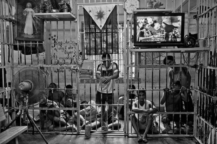 LOCKED UP. Detainees at the Manila Police District. This image appeared in Rocamora's 2018 photobook 'Human Wrongs,' a 6-year project that documented life inside Philippine detention centers. File photograph by Rick Rocamora 