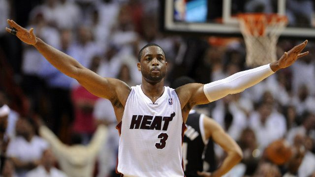 NBA: Heat cool off Mavs as flu-struck Wade contributes off the bench