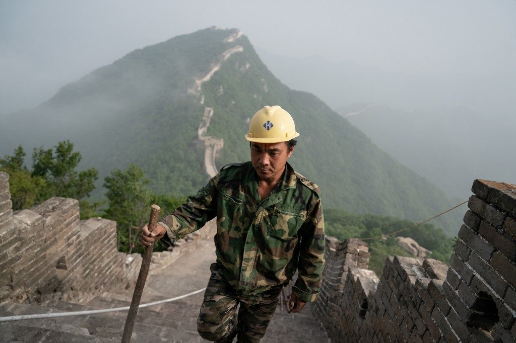 Mules, tools and old bricks: Rebuilding China’s Great Wall