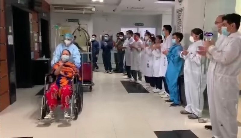 WATCH: Laguna doctors, medical staff send off recovered coronavirus patient with an applause