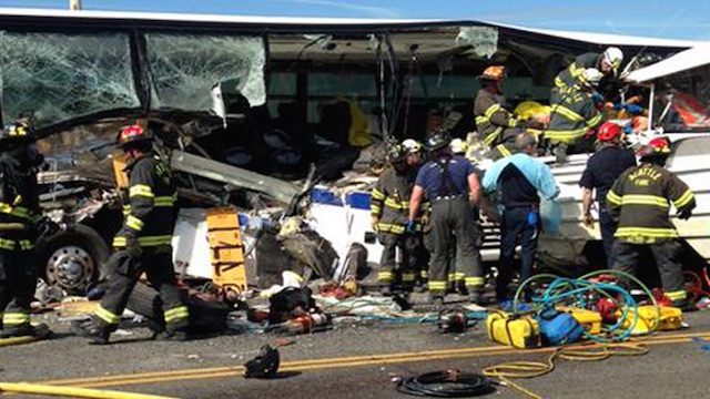 BUS CRASH. A bus crash in Seattle between a school bus and a tour bus kills 4 students. Photo by EPA 
