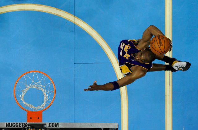 Kobe Bryant delivers a dunk in the Western Conference finals. The Lakers would later meet the Orlando Magic in the NBA Finals and win 4-1. Photo by Larry W. Smith/EPA  