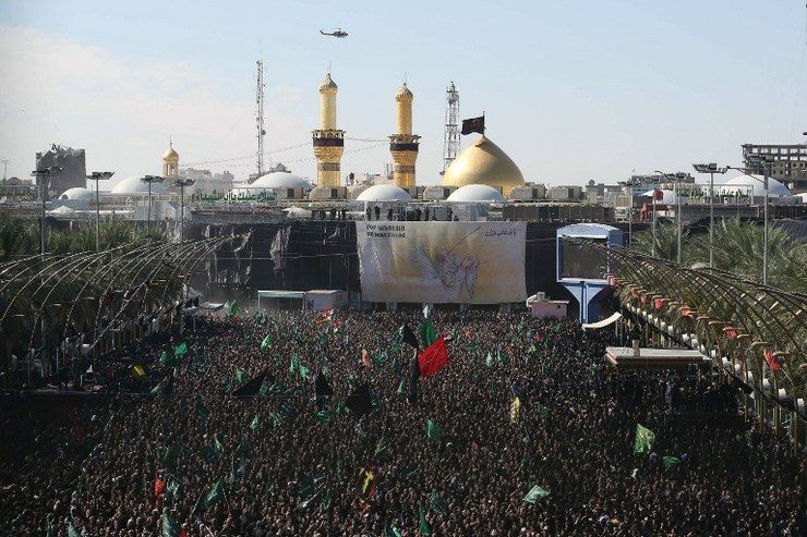 Shiites mark holy day in defiance of jihadists