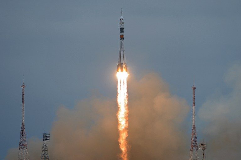Two Russians, one American blast off to ISS