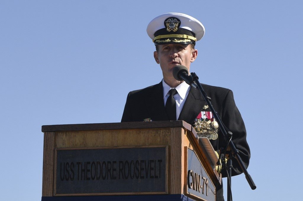 Pentagon removes captain of virus-struck aircraft carrier