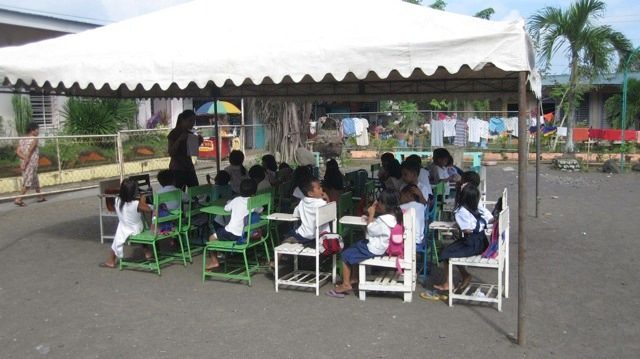 Students near Mayon take shifts in classrooms
