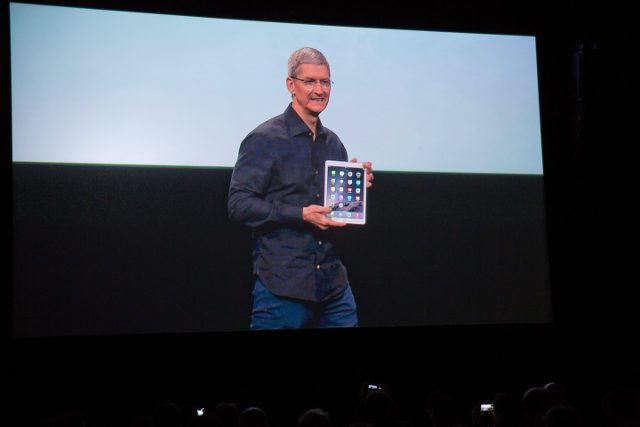 NEW YEAR, NEW IPAD? Apple chief executive Tim Cook, projected on a screen in Berlin, Germany, introduces the new ipad tablet as Apple unveiled the iPad Air 2 at the tech giant company's campus in Cupertino, California, USA, on October 16, 2014. File Photo by Joerg Carstensen/EPA  