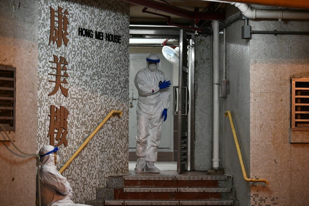 Hong Kong housing block evacuated after double virus find