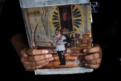 Thai protester arrested for sharing new king article on Facebook