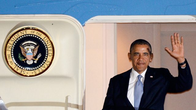 ARRIVAL. US President Barack Obama waves as he steps out from Air Force One after landing at Haneda International Airport in Tokyo, Japan, 23 April 2014. EPA/FRANCK ROBICHON