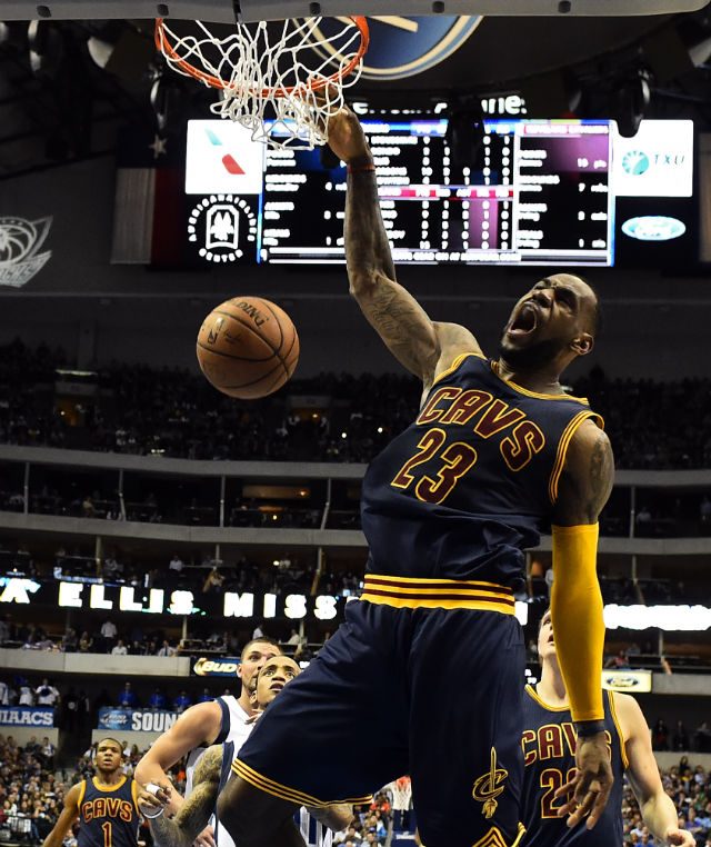WATCH: Headband-less LeBron powers Cavs to rout of Mavs