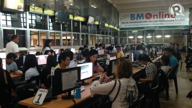 TICKET TO WORK. Overseas Filipino workers applying for their overseas employment certificates through the POEA's Balik Manggagawa Online Processing System. Photo by Mara Cepeda/Rappler 
