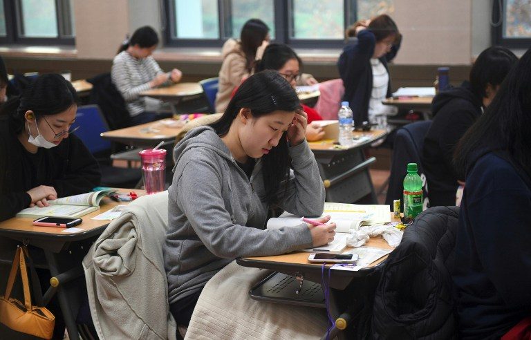 South Korea falls silent for crucial college entrance exam