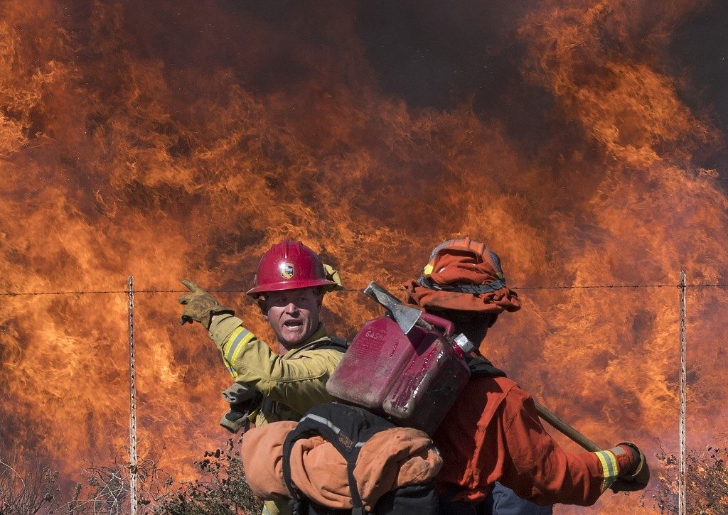 California fires: new blazes as dangerous winds fan the flames