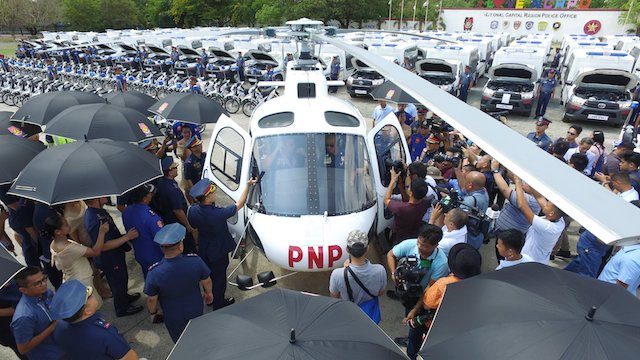CHOPPER TEST. PNP officials hop on the newly procured Airbus helicopter at Camp Bagong Diwa. PNP photo 