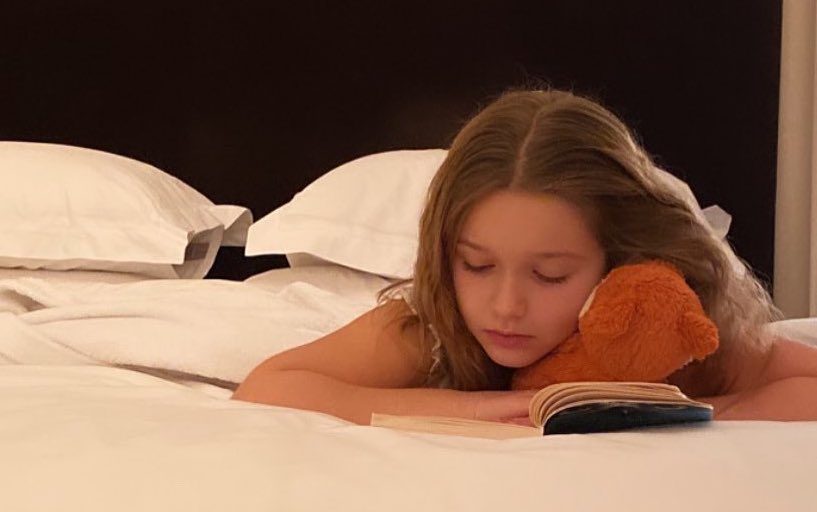 PHONES OFF. Harper Seven Beckham reads books right before going to bed instead of using her devices. Photo from David Beckham's Instagram 