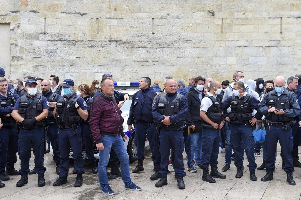Furious French police protest racism claims