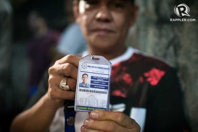 KIAN IS MY SON. Saldy delos Santos holds up his son's school ID, their only proper photo of Kian. Photo by Eloisa Lopez/Rappler 