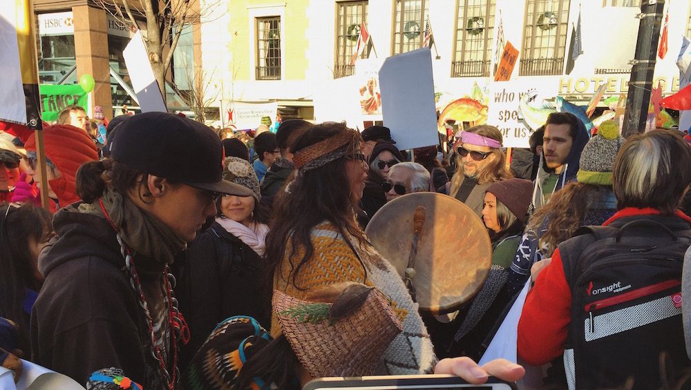 CLIMATE ACTIVISM. Audrey Siegl, representing one of Canada's aboriginals, beats her drum as she sings the Women's Warrior Song. Photo from Chaya Ocampo and Steffi Tad-y  