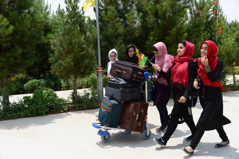 Afghan girls robotics team land in U.S. after visa U-turn