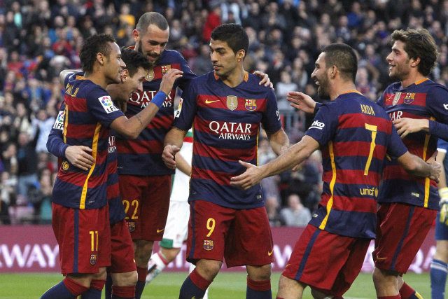 Messi hat trick moves Barca back on top of La Liga