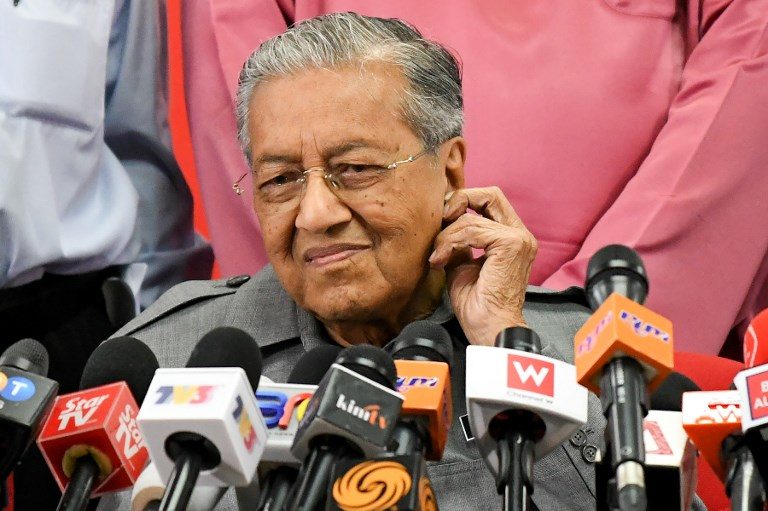 Malaysia issues arrest warrant for financier over 1MDB scandal