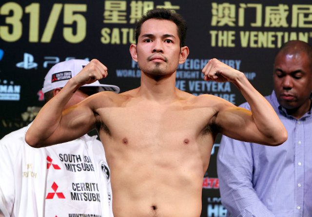 Nonito Donaire Jr. on the scales. Photo by Chris Farina - Top Rank