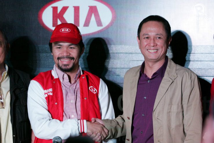 Manny Pacquiao shakes hands with PBA commissioner Chito Salud after being announced as KIA's head coach. Photo by Josh Albelda