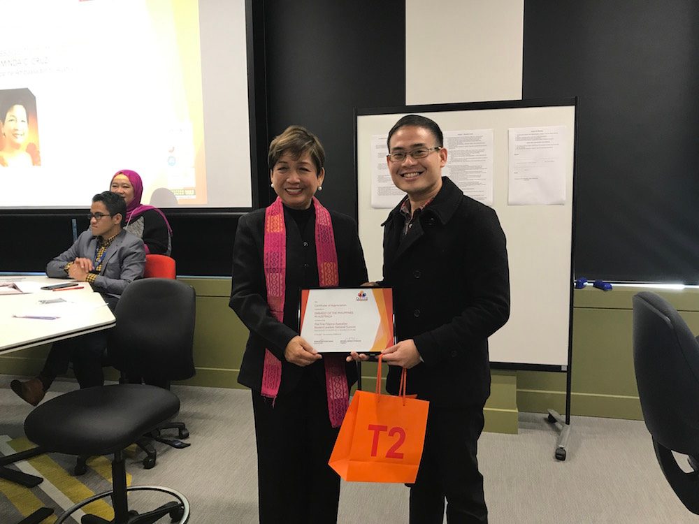 DREAM UNFOLDING. FASTCO President Mike Malcisi gives a token of appreciation to Philippine Ambassador Minda Cruz during the First Filipino Australian Student Leaders summit at the University of Melbourne. Photo by David Lozada/ Rappler 