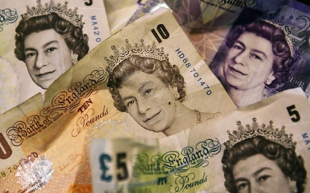 Pound plunges, stock markets in turmoil on Brexit vote