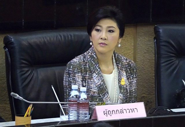 Thai former PM Yingluck to face trial over rice scheme – court
